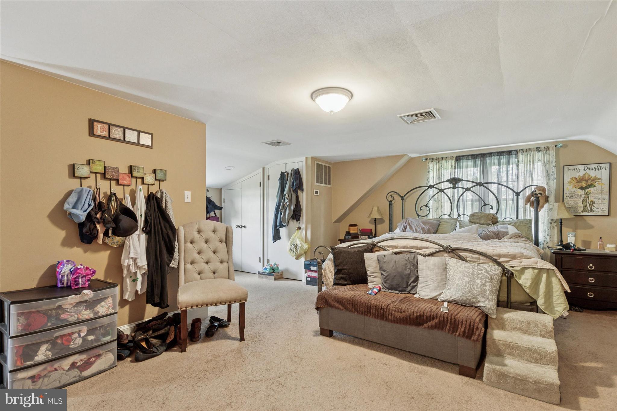 423 Deep Run Road Perkasie, PA 18944 - Photo 11 of 25 a bedroom with furniture and a gym equipment