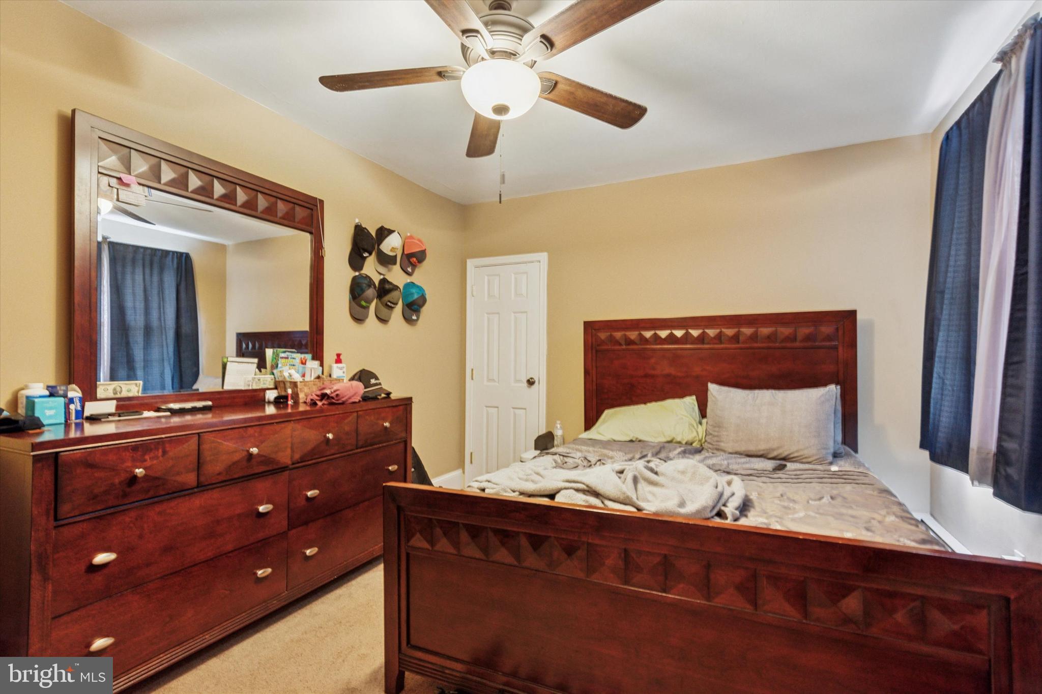 423 Deep Run Road Perkasie, PA 18944 - Photo 14 of 25 a bedroom with a large bed and a chandelier