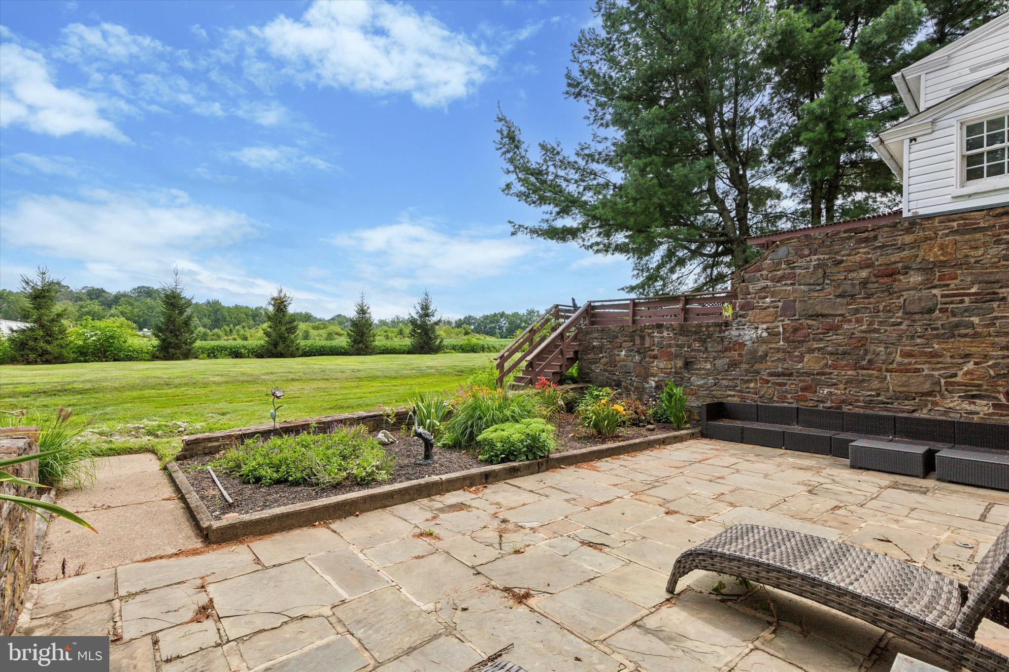 423 Deep Run Road Perkasie, PA 18944 - Photo 21 of 25 a view of a backyard with a garden