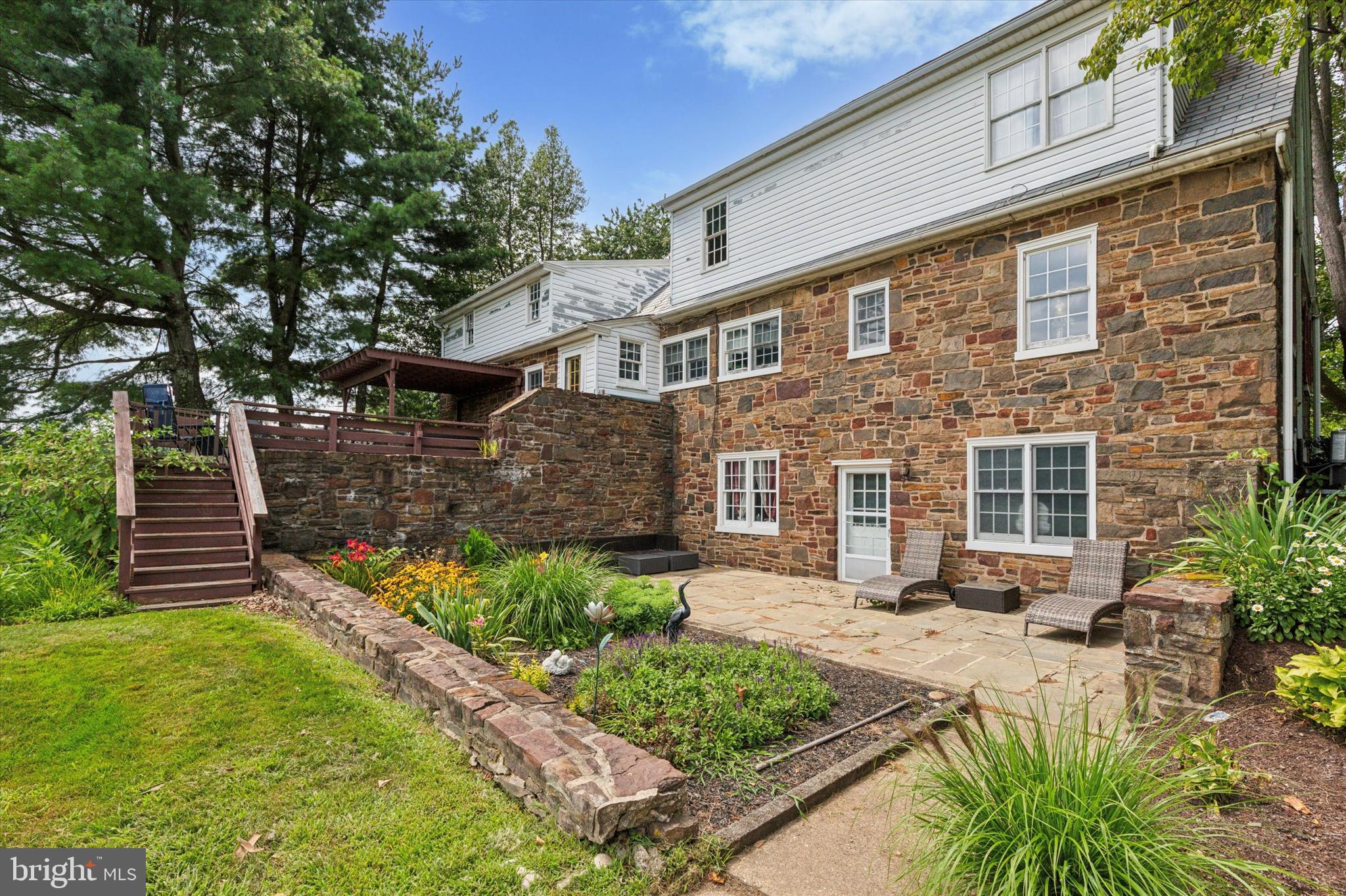 423 Deep Run Road Perkasie, PA 18944 - Photo 22 of 25 a front view of a house with garden