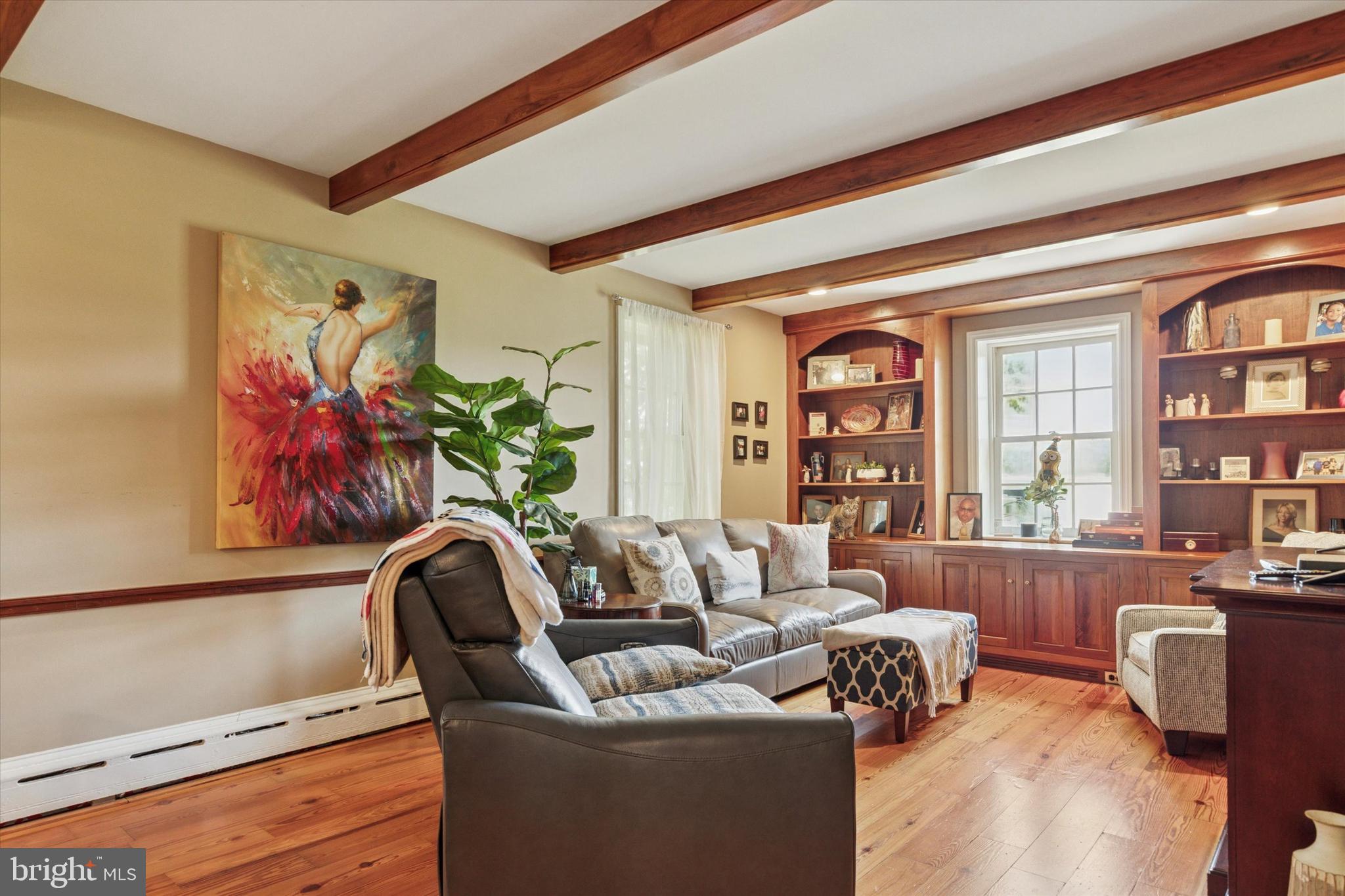 423 Deep Run Road Perkasie, PA 18944 - Photo 3 of 25 a living room with furniture fireplace and wooden floor