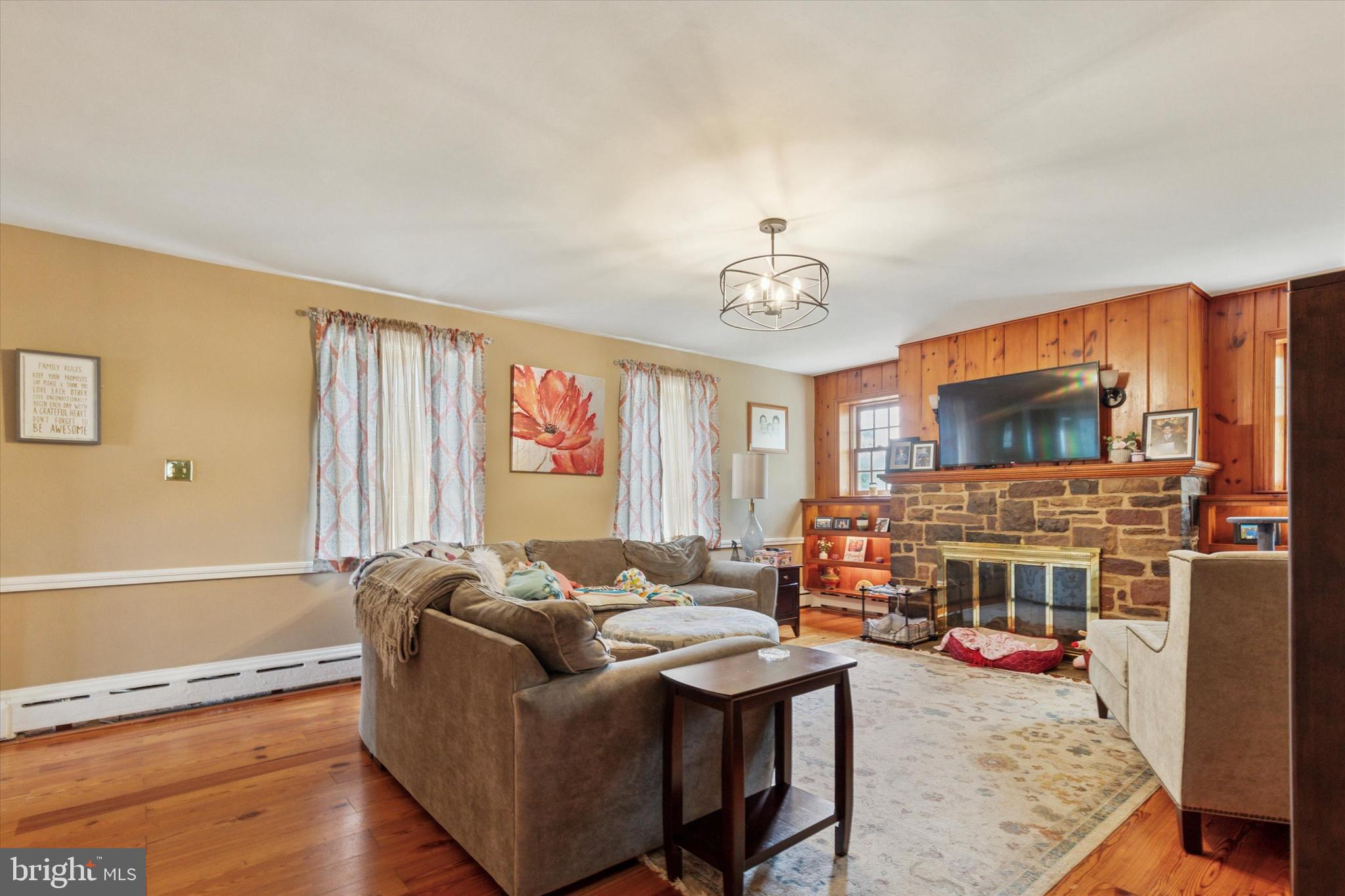 423 Deep Run Road Perkasie, PA 18944 - Photo 6 of 25 a living room with furniture and a flat screen tv