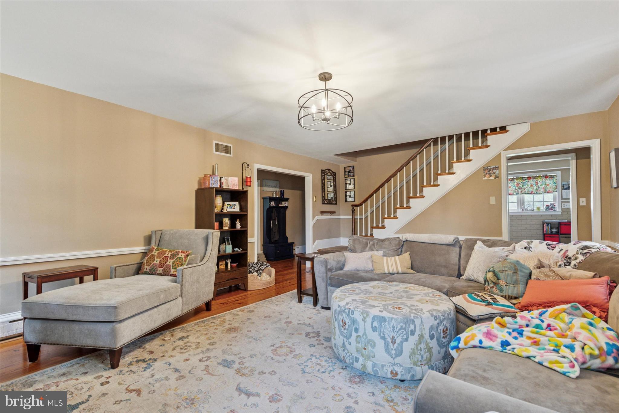 423 Deep Run Road Perkasie, PA 18944 - Photo 7 of 25 a living room with furniture and wooden floor