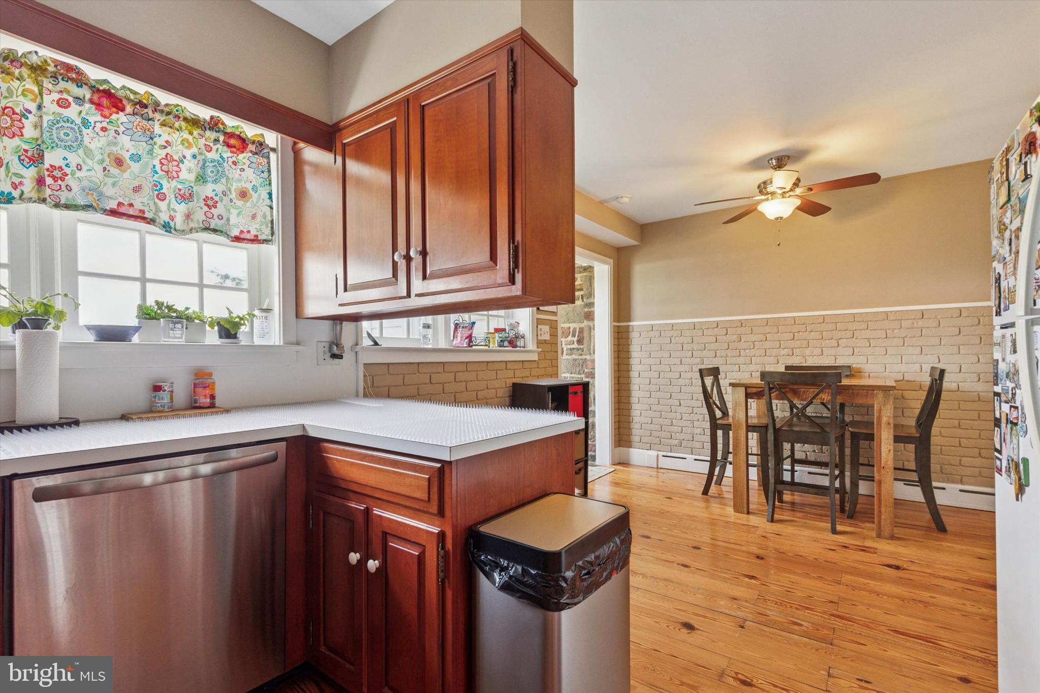 423 Deep Run Road Perkasie, PA 18944 - Photo 9 of 25 a kitchen with a stove a sink and a refrigerator