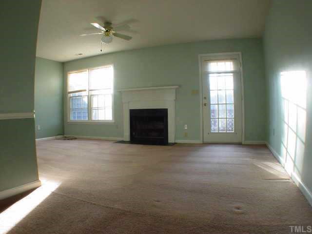 Living Room, with access to the deck and yard...