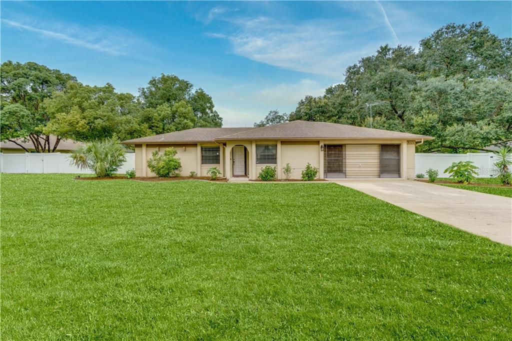 8388 Annapolis Road Spring Hill, FL 34608 - Photo 1 of 1 a view of house that has a yard