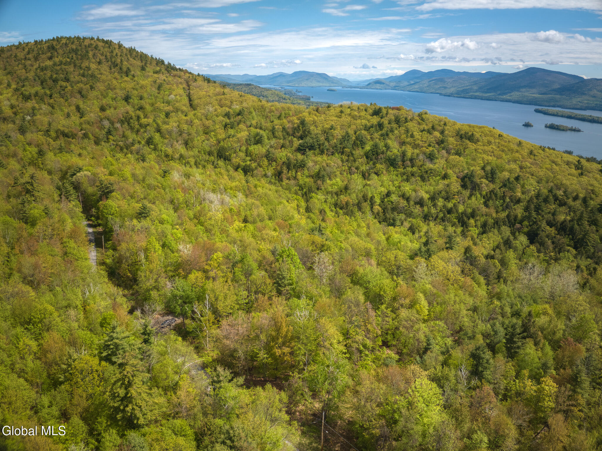 L63.011 Shaw Road, Unit A2 Lake George, NY 12845 - Photo 9 of 17 DJI_20240513102917_0063_D