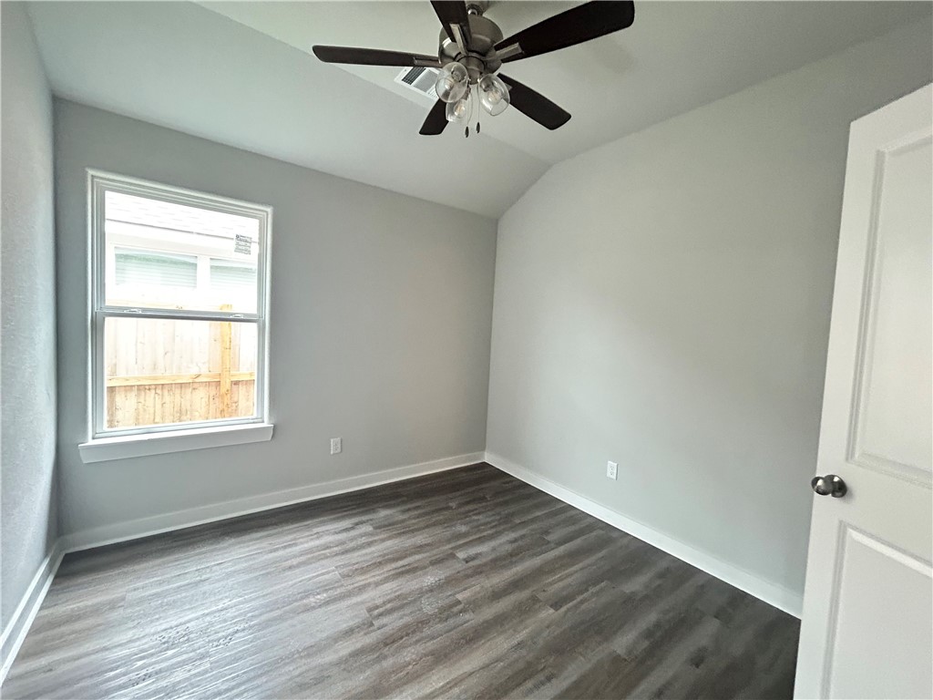 2791 Messenger Way Bryan, TX 77803 - Photo 9 of 15 wooden floor in an empty room with a window