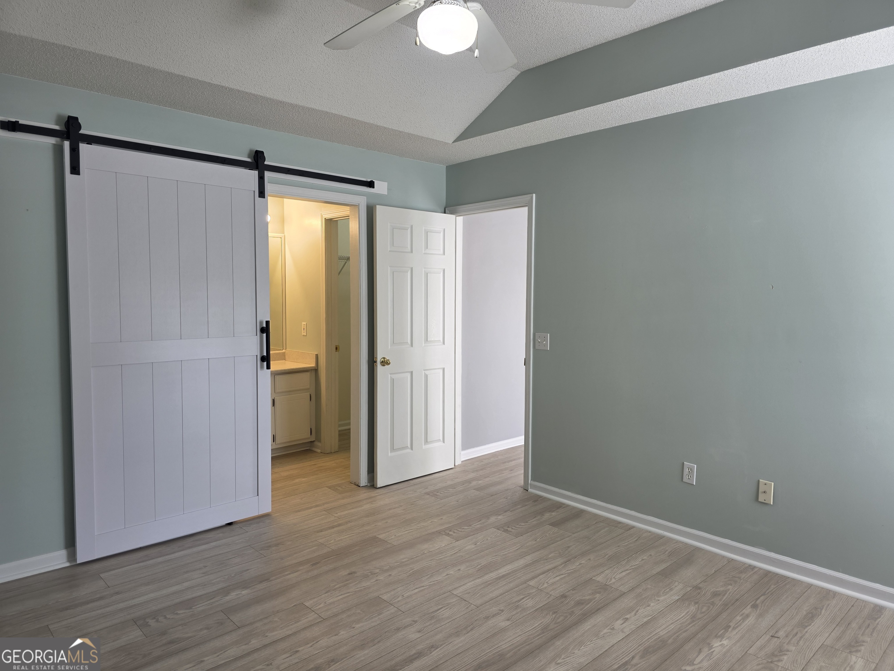 136 Towne Park Drive West Rincon, GA 31326 - Photo 18 of 24 a view of an empty room with wooden floor and a window