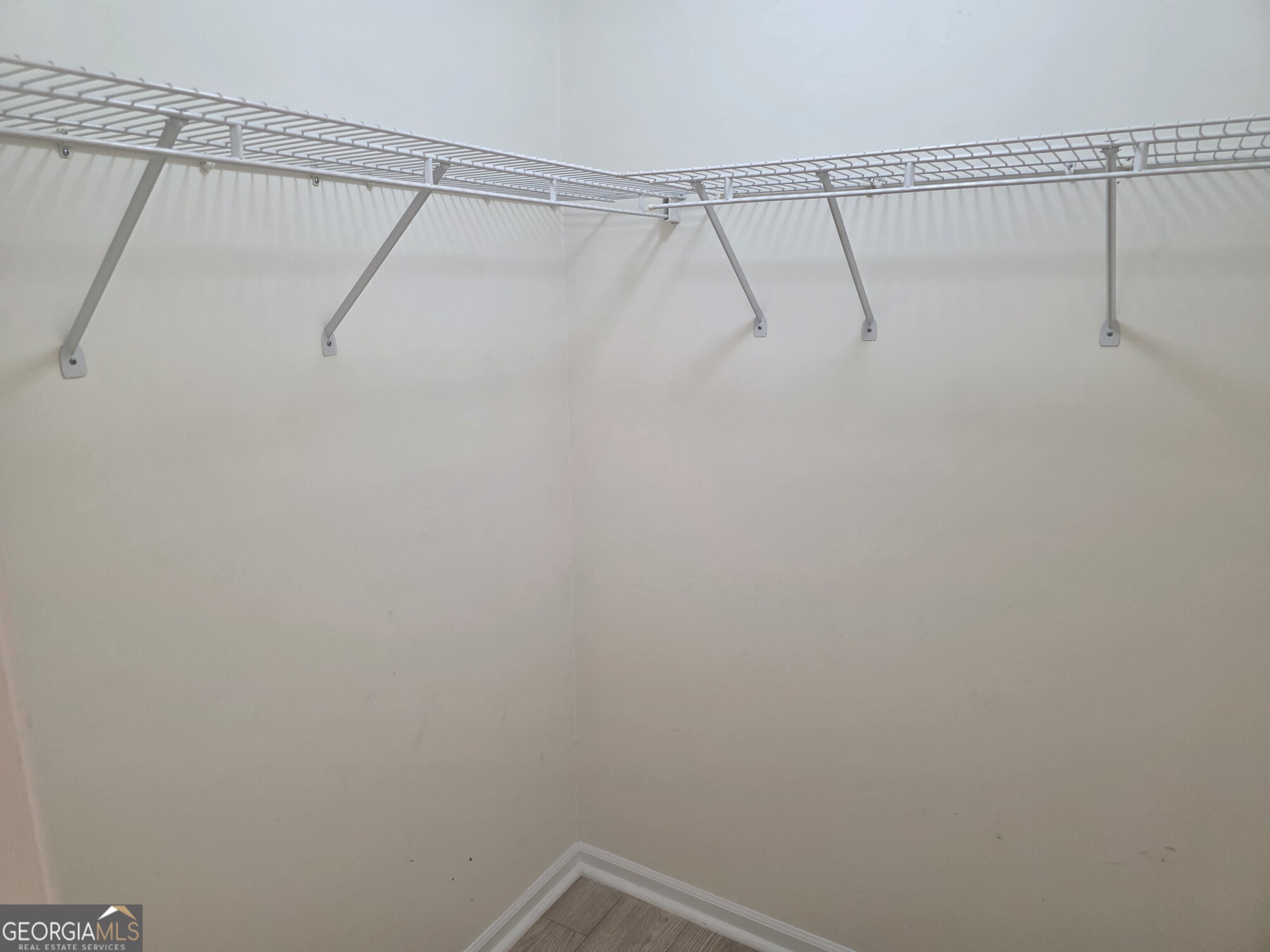 136 Towne Park Drive West Rincon, GA 31326 - Photo 21 of 24 a view of a room with racks on the wall