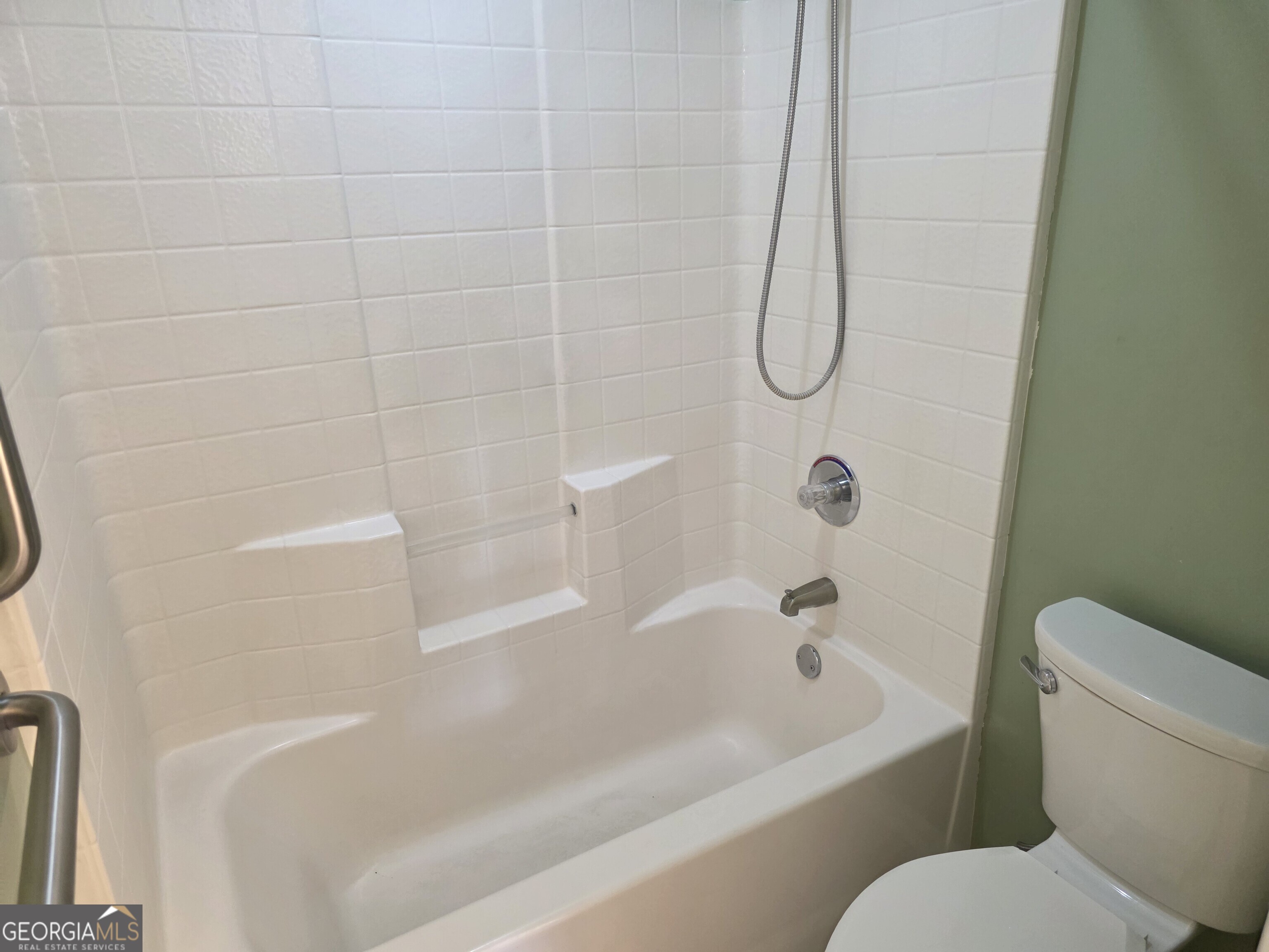 136 Towne Park Drive West Rincon, GA 31326 - Photo 22 of 24 a bathroom with a toilet and a bath tub
