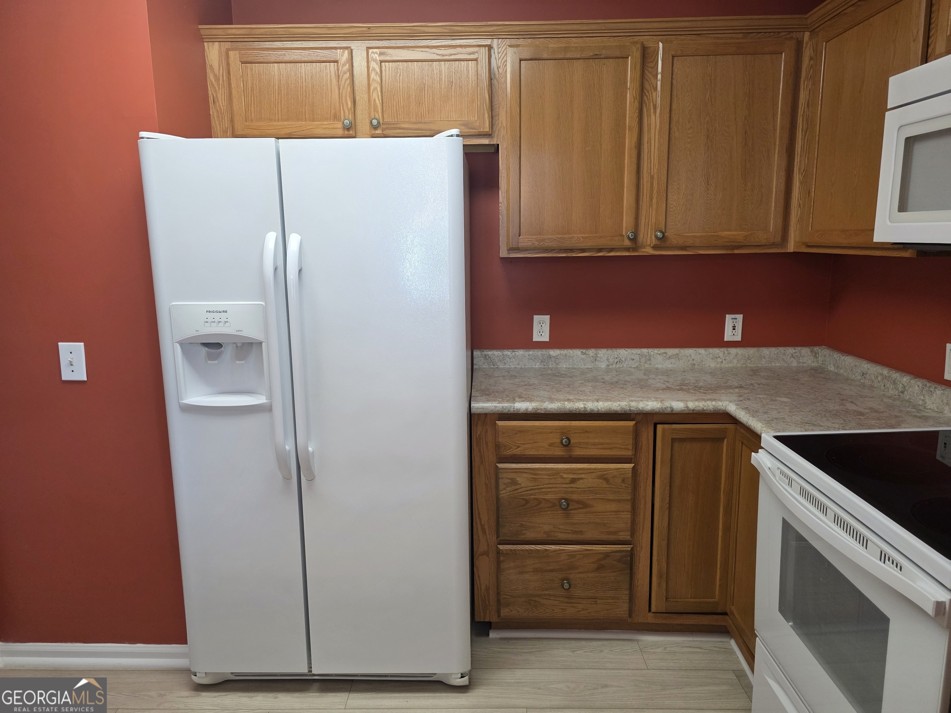 136 Towne Park Drive West Rincon, GA 31326 - Photo 8 of 24 a kitchen with cabinets and a refrigerator