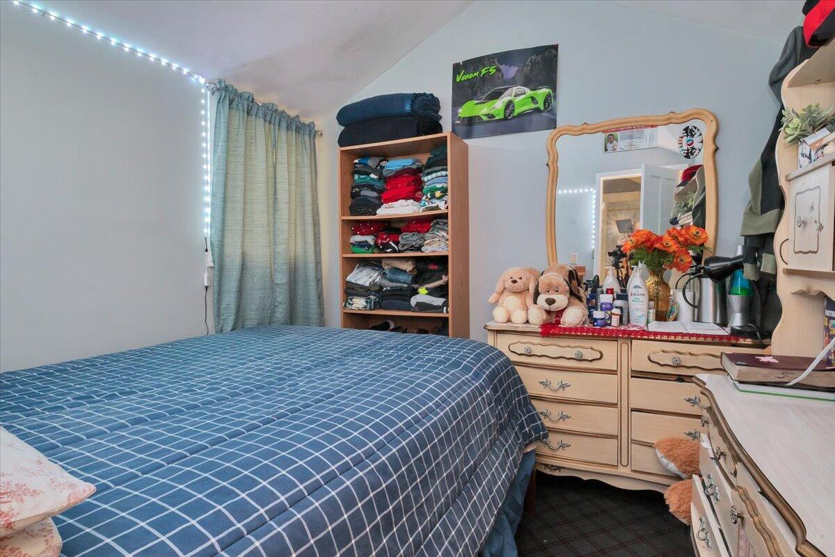 49 Salt Pond Road Eastham, MA 02642 - Photo 54 of 67 a bedroom with a bed and a window