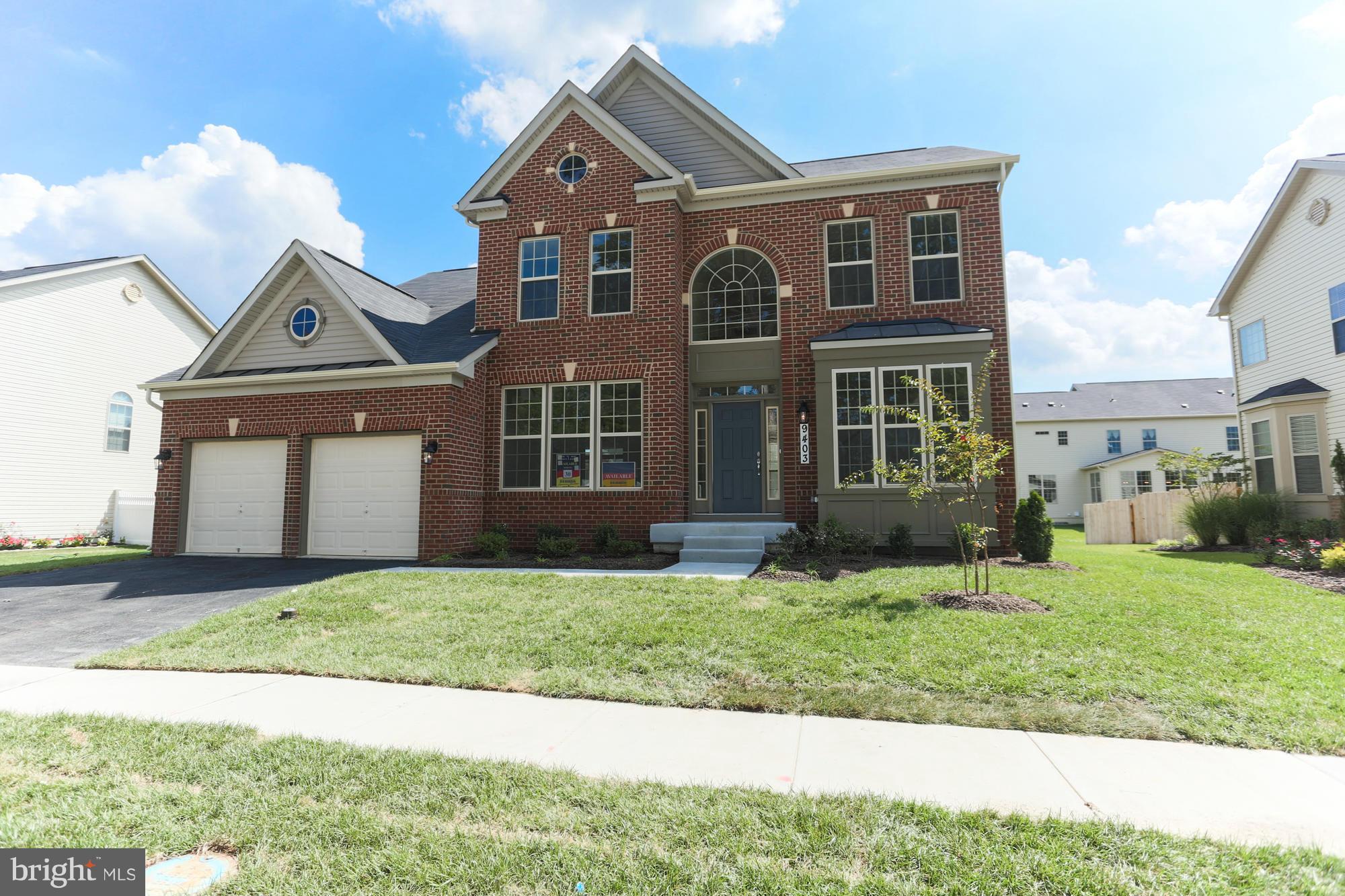 9404 Cross Road Perry Hall, MD 21128 - Photo 2 of 30 a front view of a house with a yard