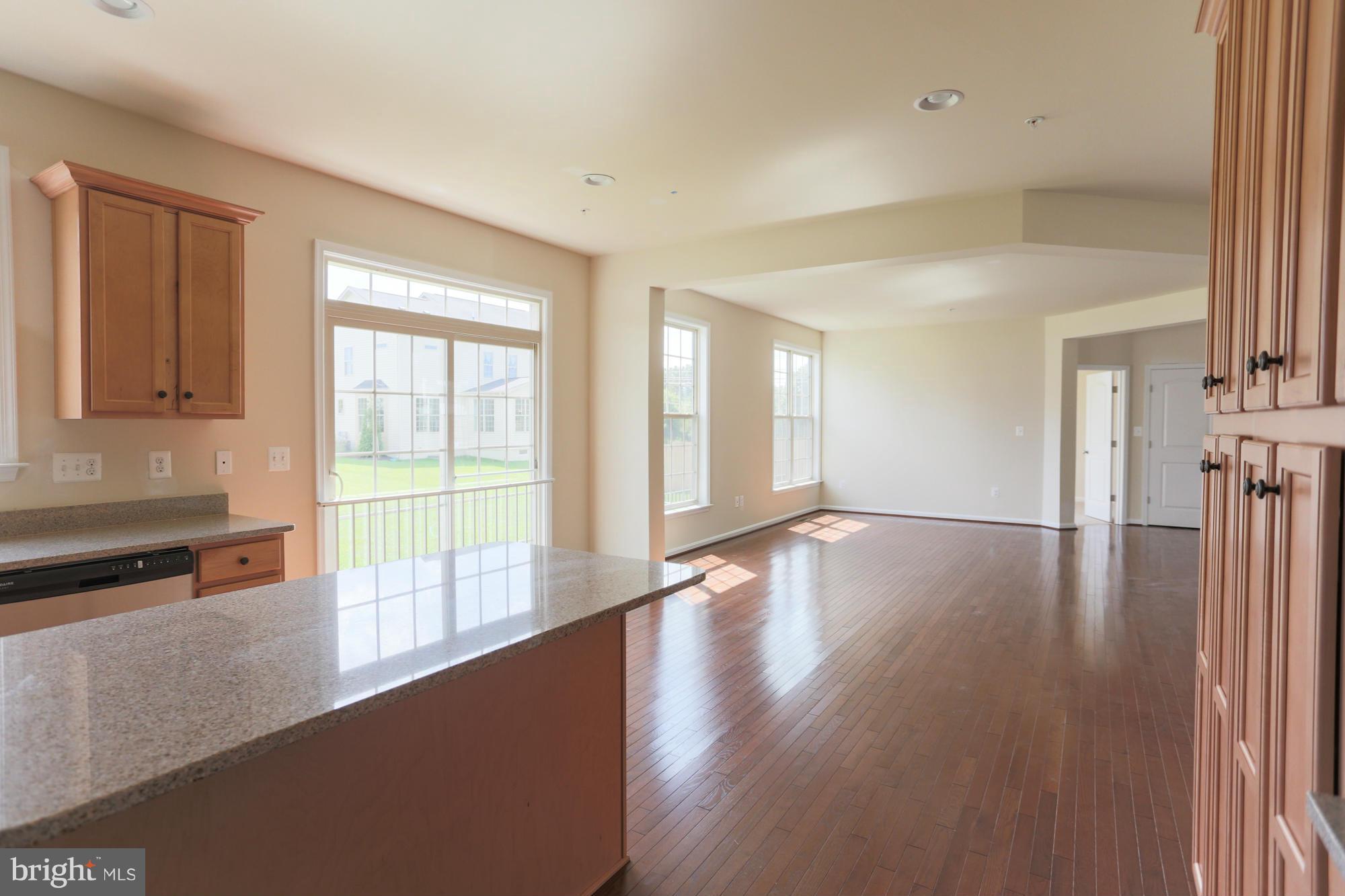 9404 Cross Road Perry Hall, MD 21128 - Photo 13 of 30 a view of a room with wooden floor and a window