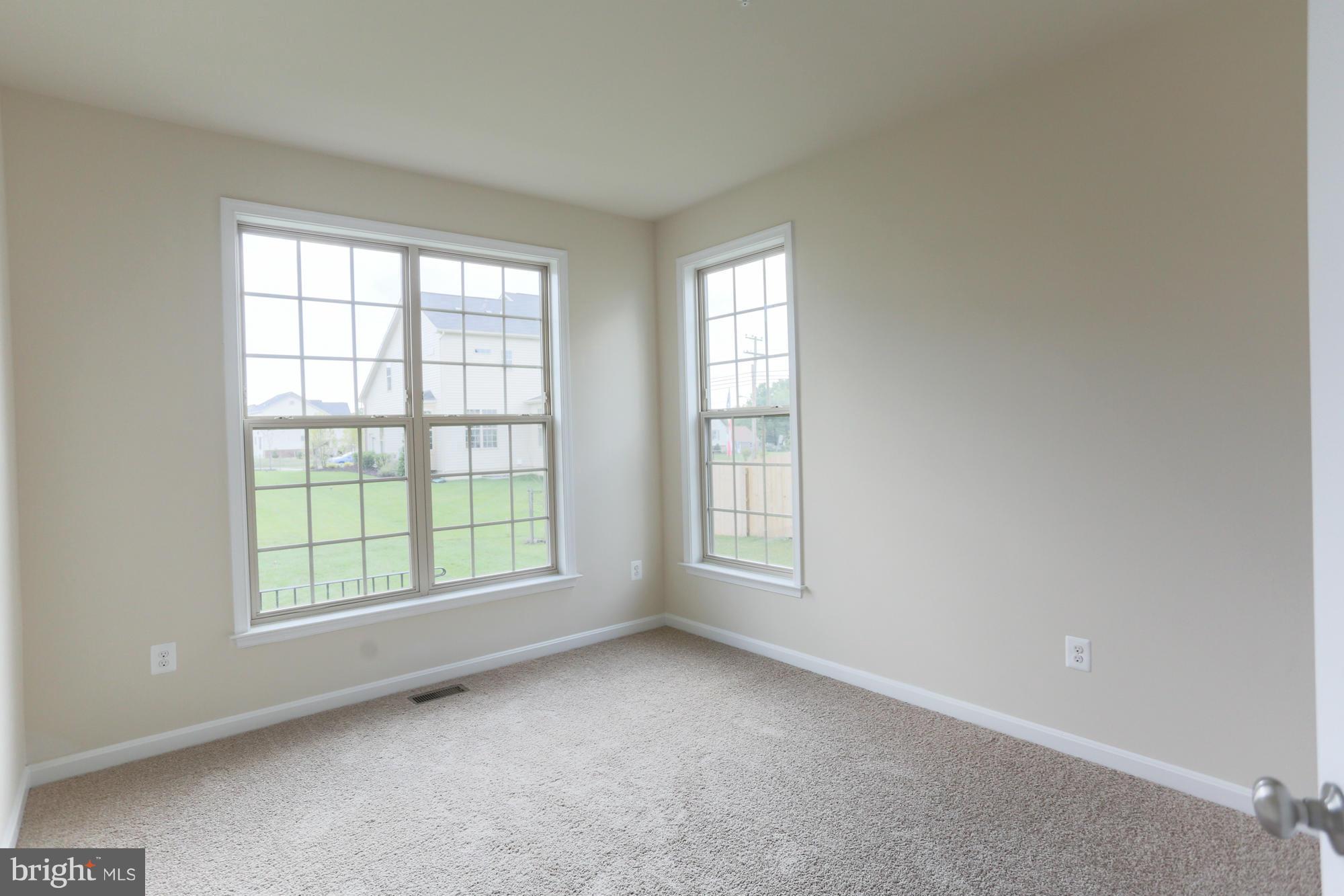 9404 Cross Road Perry Hall, MD 21128 - Photo 19 of 30 an empty room with windows