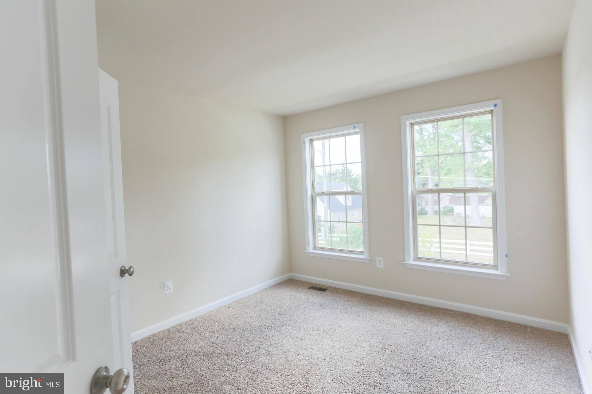 9404 Cross Road Perry Hall, MD 21128 - Photo 21 of 30 an empty room with windows