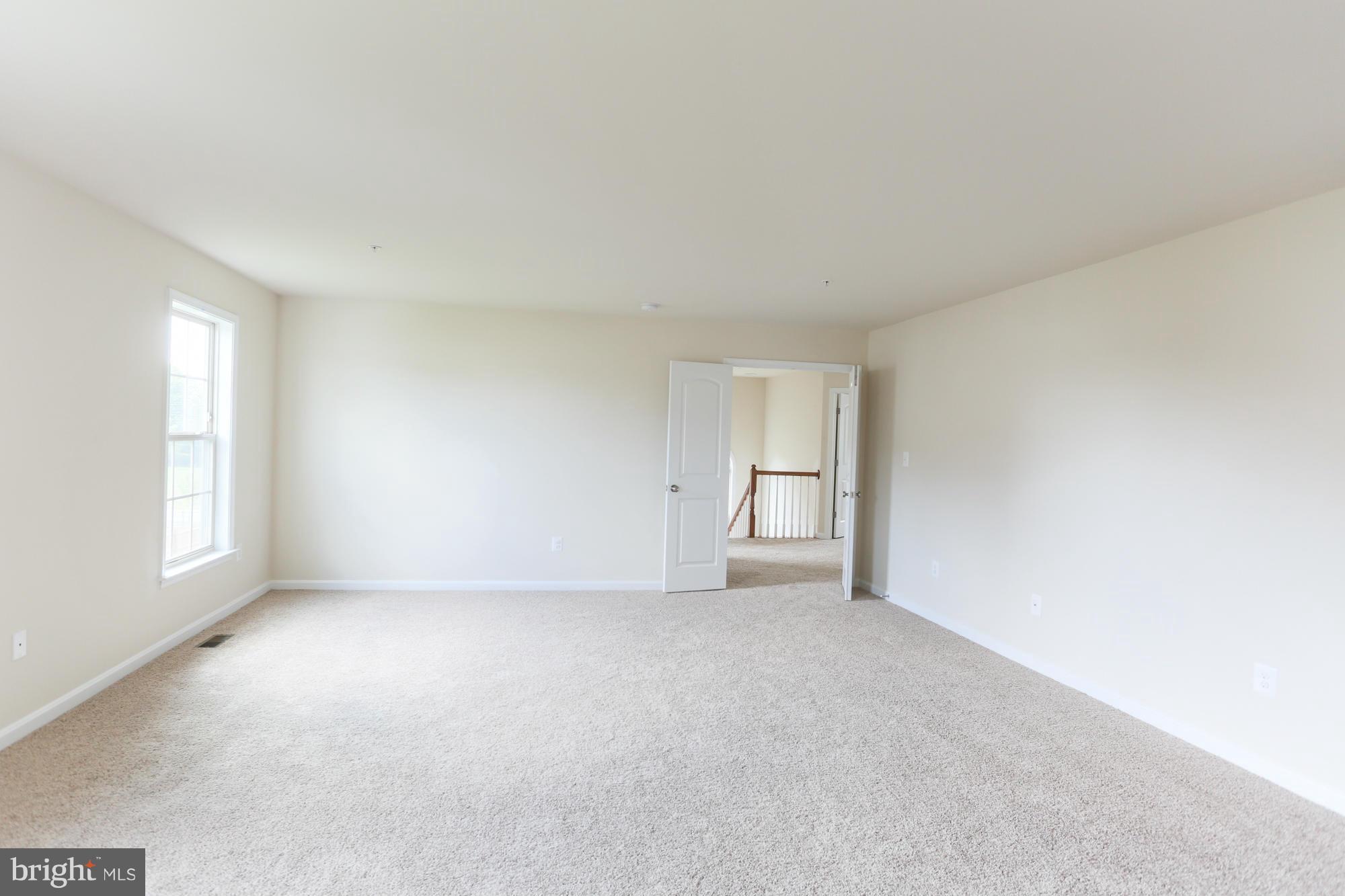 9404 Cross Road Perry Hall, MD 21128 - Photo 27 of 30 an empty room with windows