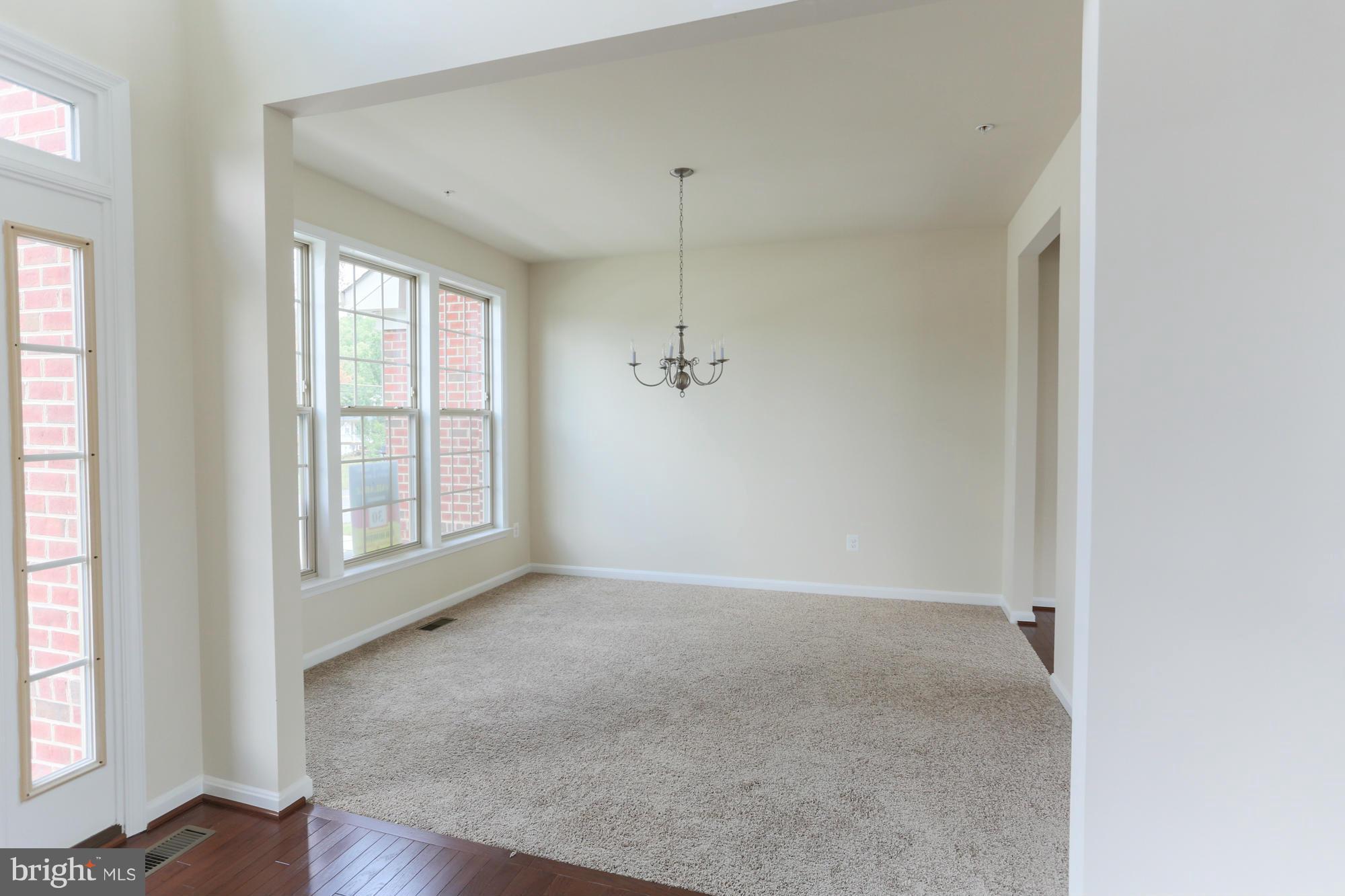 9404 Cross Road Perry Hall, MD 21128 - Photo 6 of 30 an empty room with windows