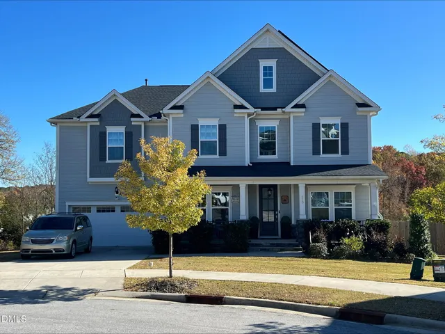 a front view of a house with entertaining space