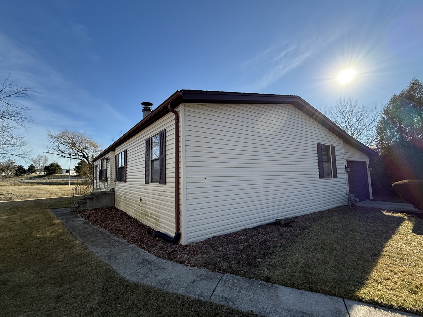 a house view with a backyard space