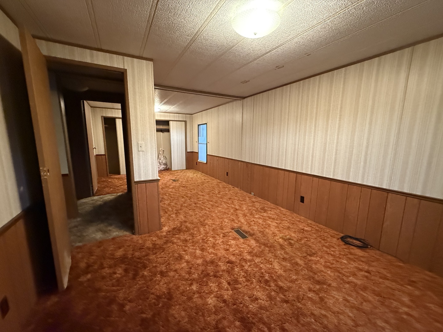 602 Tanglewood Road Matteson, IL 60443 - Photo 9 of 26 a view of an empty room with wooden floor