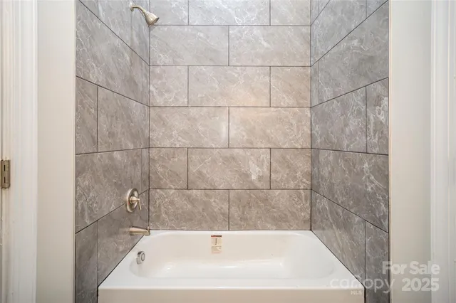 a bathroom with a bathtub