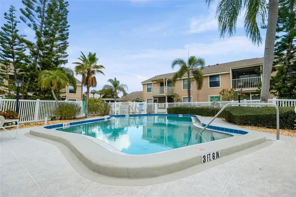 a view of a house with swimming pool