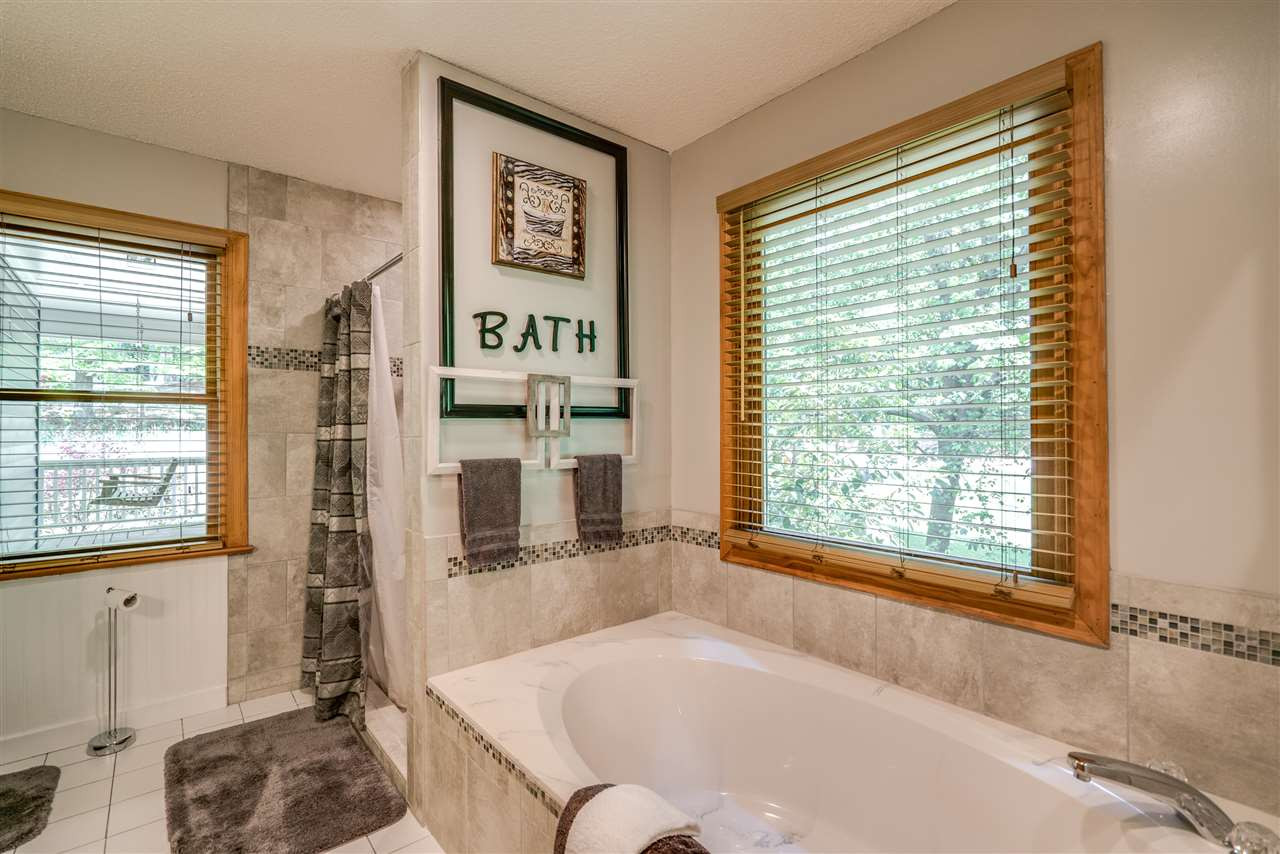 12200 Galway Drive Raleigh, NC 27613 - Photo 12 of 25 Updatd Master Bath with new tile and paint! Master Bath