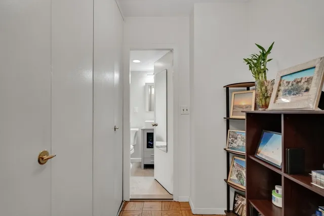 a view of an entryway with wooden floor