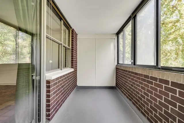 a view of room with window and stairs