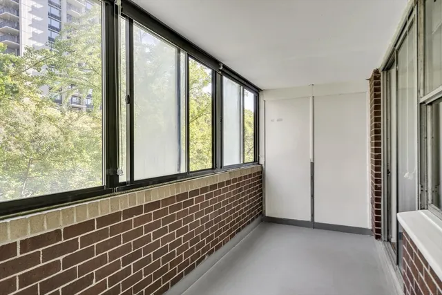 a view of an empty room and window