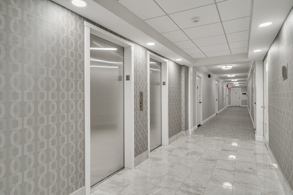 9 Hawthorne Place, Unit 5K Boston, MA 02114 - Photo 25 of 37 a view of a hallway