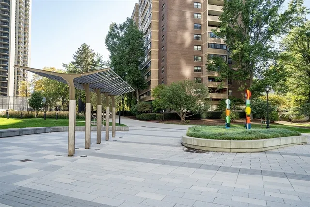 a view of a street with trees on both side of it