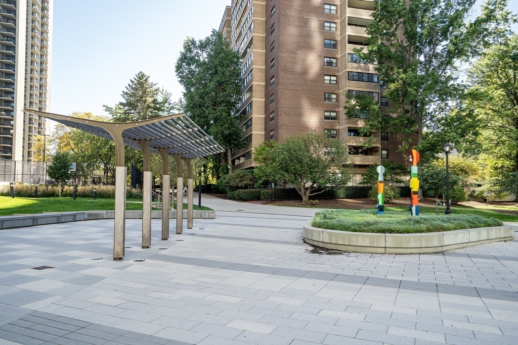 9 Hawthorne Place, Unit 5K Boston, MA 02114 - Photo 30 of 37 a view of a park with a apartment