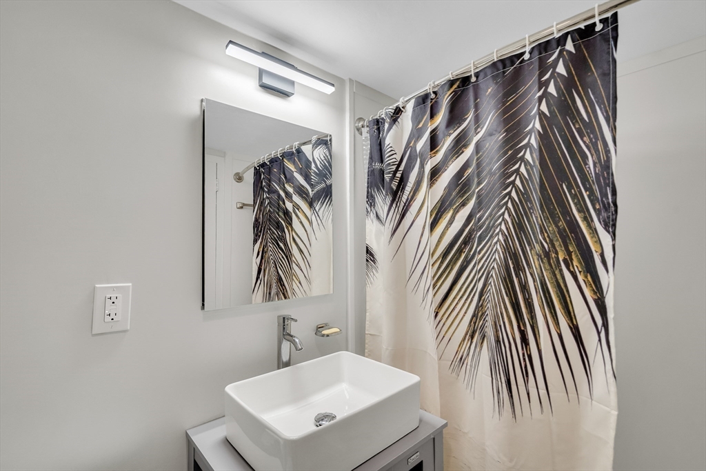 9 Hawthorne Place, Unit 5K Boston, MA 02114 - Photo 6 of 37 a view of walk in closet with clothes and shoes