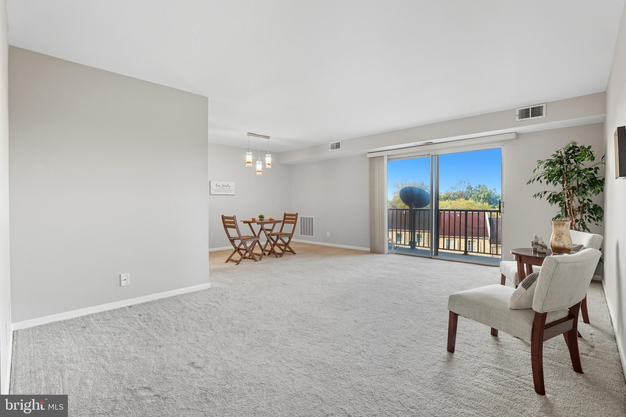 12001 Old Columbia Pike, Unit 508 Silver Spring, MD 20904 - Photo 1 of 22 a view of a livingroom with furniture
