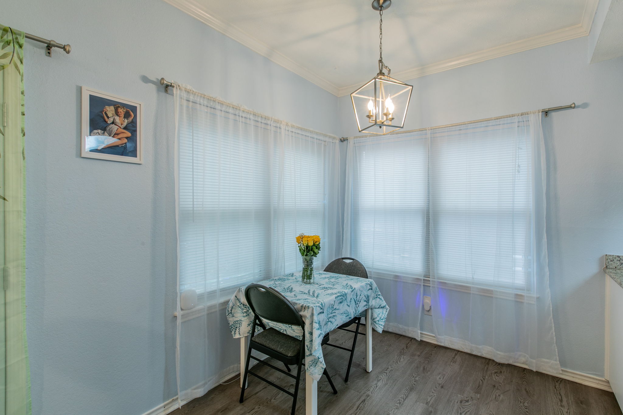 1005 North LBJ Drive, Unit B2 San Marcos, TX 78666 - Photo 6 of 19 a view of a workspace with furniture and wooden floor