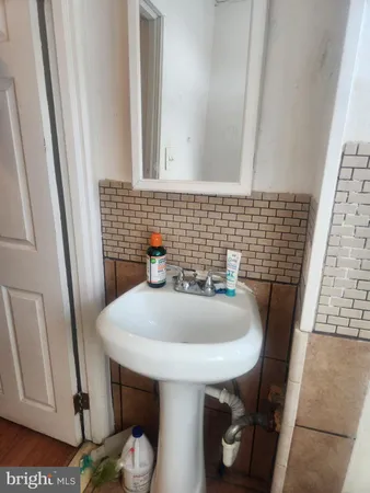 a bathroom with a sink and a toilet