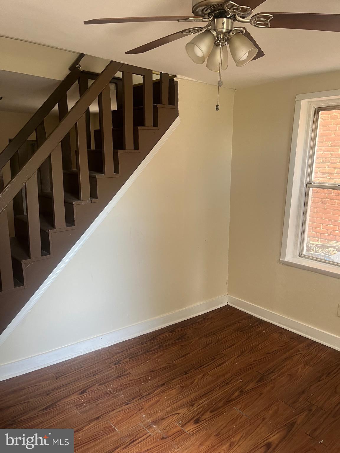 405 East Rittenhouse Street Philadelphia, PA 19144 - Photo 2 of 12 a view of a hallway with wooden floor and staircase