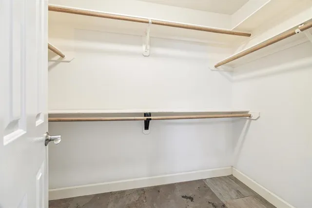 a view of a room with racks on the wall