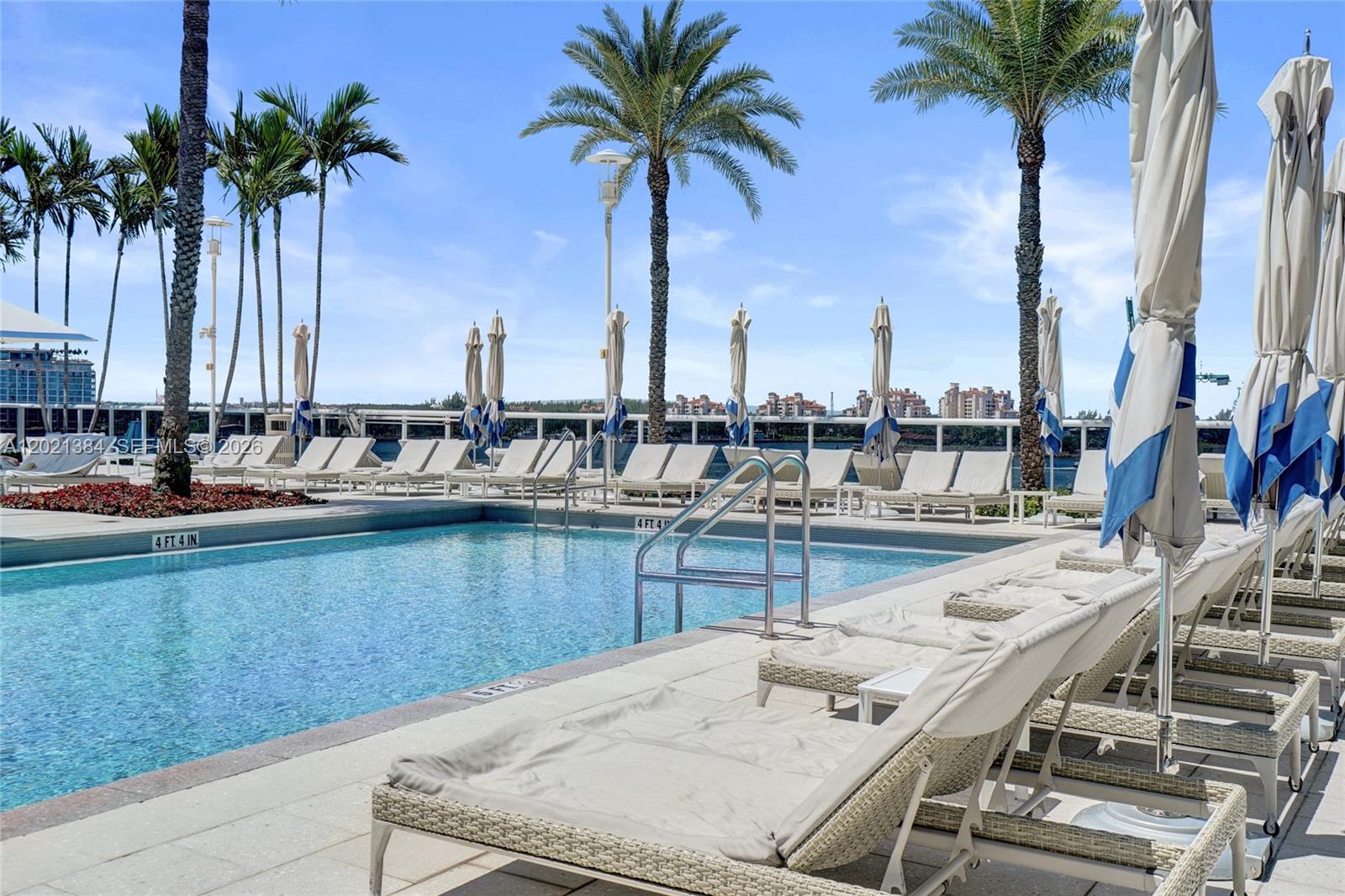 400 Alton Road, Unit PH11 Miami Beach, FL 33139 - Photo 2 of 49 a view of ocean with boats and palm trees