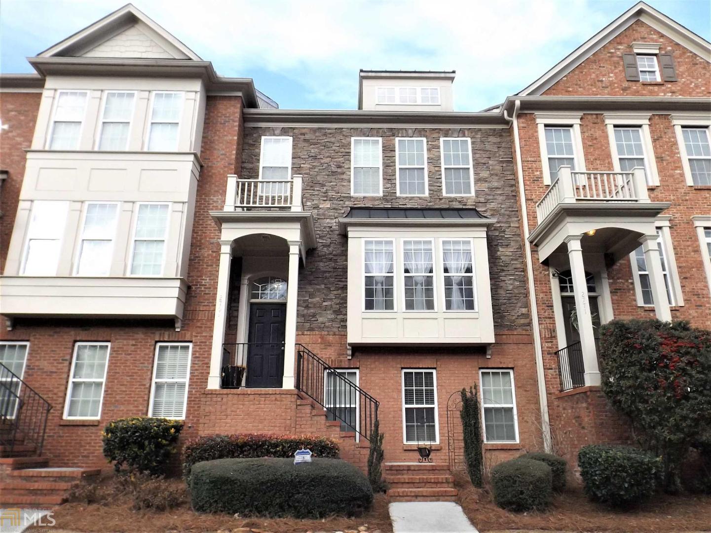 2769 Loftview Square Atlanta, GA 30339 - Photo 1 of 1 a front view of a house with a yard