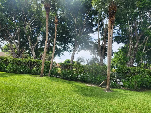 a view of outdoor space with swimming pool and furniture
