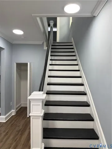 a bathroom with a bathtub shower sink vanity and toilet