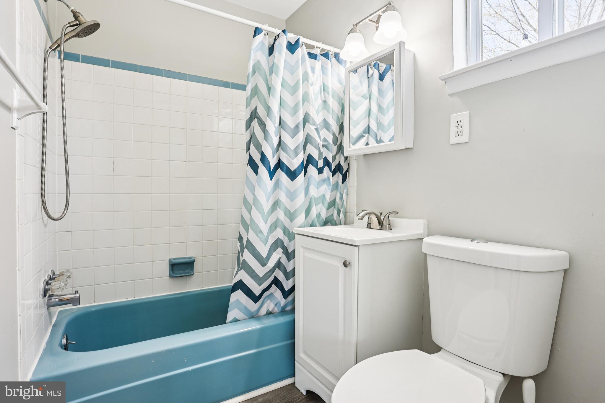 15 Brimfield Road Audubon, PA 19403 - Photo 20 of 41 a bathroom with a sink a toilet and shower