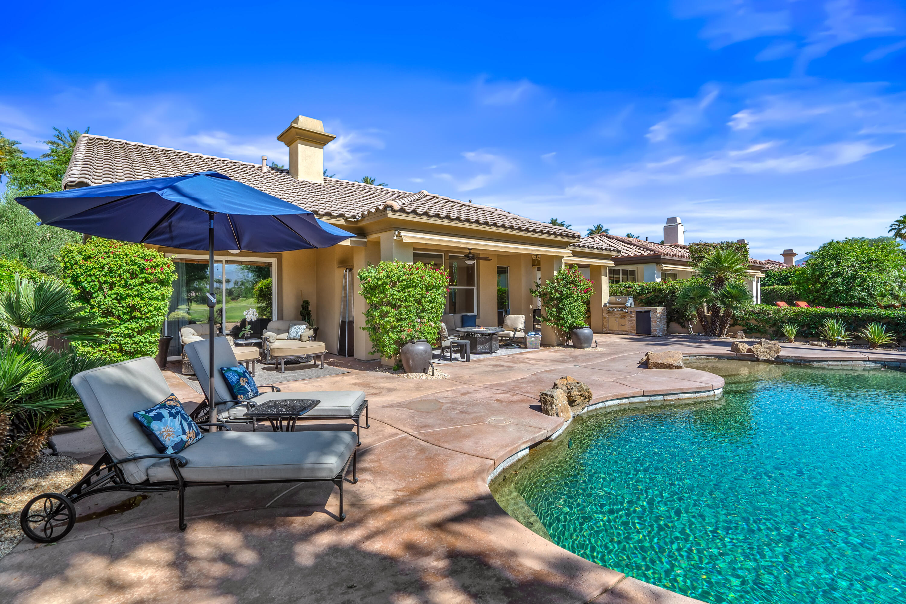 56925 Mountain View La Quinta, CA 92253 - Photo 46 of 57 Multiple pool lounging areas