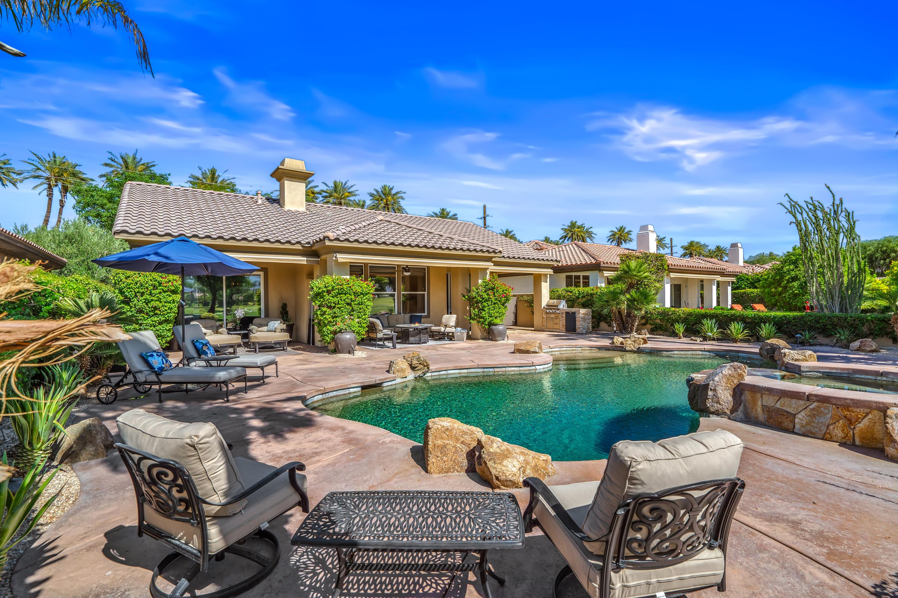 56925 Mountain View La Quinta, CA 92253 - Photo 47 of 57 Multiple pool lounging areas