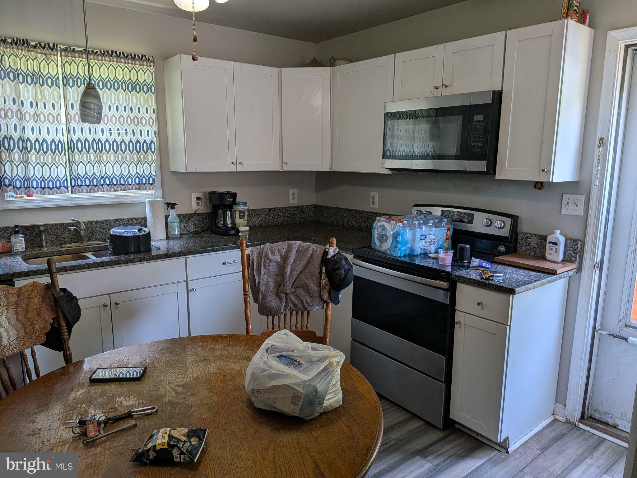 10198 Old Rapidan Road Orange, VA 22960 - Photo 4 of 29 Cozy kitchen with modern touches.
