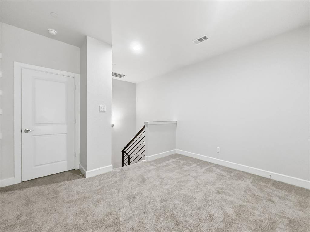 5704 Woodlands Drive The Colony, TX 75056 - Photo 9 of 23 a view of an empty room